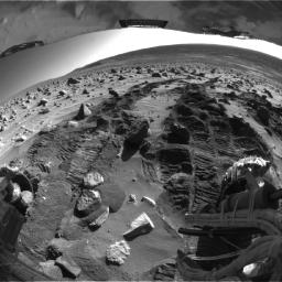 Potato-size Rock in Spirit's Wheel Well